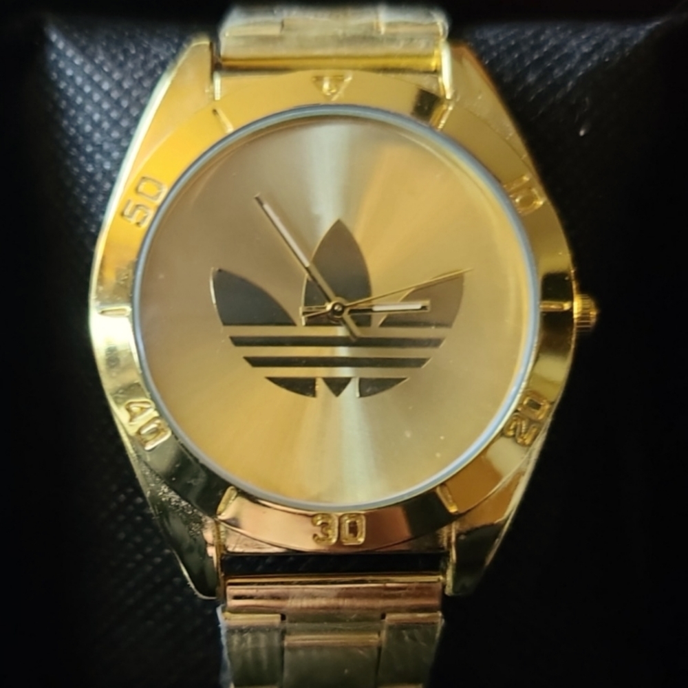 Gold tone Adidas watch